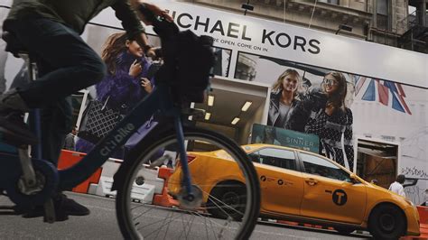 who is michael kors buying|who is coach owned by.